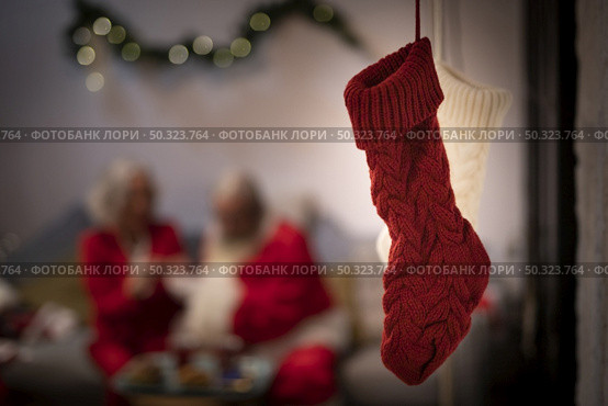 close up red white christmas socks. Стоковое фото, агентство Ingram Publishing / Фотобанк Лори
