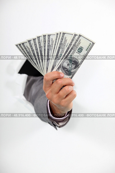 Close-up shot of American banknotes. Стоковое фото, агентство Ingram Publishing / Фотобанк Лори