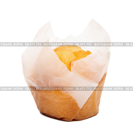 Closeup of a Magdalena Typical Spanish Plain Muffin. Sweet Food or Dessert. Fresh Baked Muffin Isolated on White Background in American Style. Irresistible Tasty Cake. Стоковое фото, агентство Ingram Publishing / Фотобанк Лори