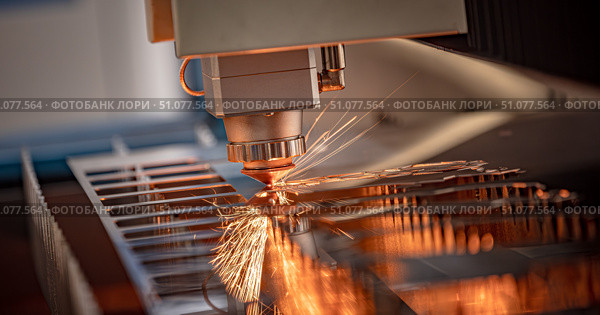 CNC Laser cutting of metal, modern industrial technology. Стоковое фото, фотограф Андрей Армягов / Фотобанк Лори