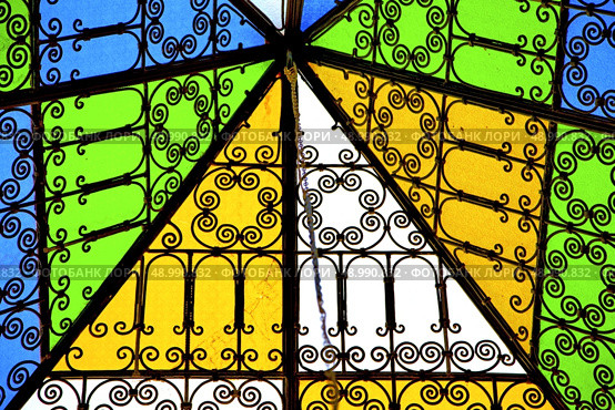 colorated glass and sun in morocco africa window and light. Стоковое фото, агентство Ingram Publishing / Фотобанк Лори