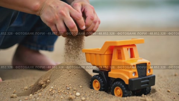 Colorful children toy bucket with sand stands in sandbox. AI Generative. Стоковое AI-видео, аниматор Spirit River / Фотобанк Лори