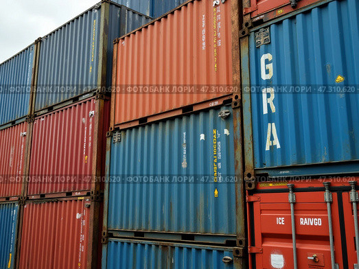 Colorful Stacked Shipping Containers at a Commercial Port During Overcast Weather in the Early Morning. Стоковое AI-изображение, AI-художник Sergey Grishin / Фотобанк Лори