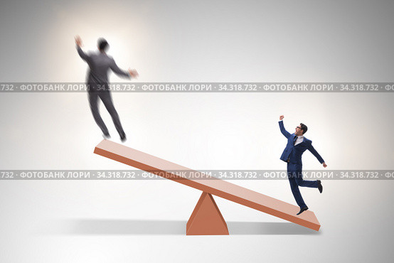 Competition concept with businessman and seesaw. Стоковое фото, фотограф Elnur / Фотобанк Лори