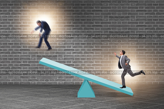 Competition concept with businessman and seesaw. Стоковое фото, фотограф Elnur / Фотобанк Лори