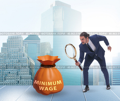 Concept of minimum wage with businessman. Стоковое фото, фотограф Elnur / Фотобанк Лори