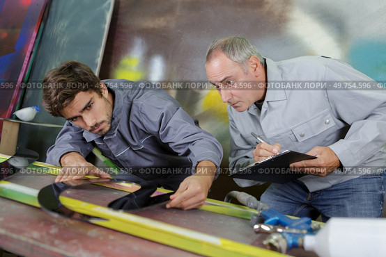 constructor specialist projecting new engine. Стоковое фото, агентство Ingram Publishing / Фотобанк Лори