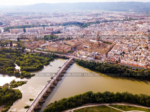 Cordoba with Roman Bridge over the Guadalquivir and the Mosque-Cathedral (2019 год). Стоковое фото, фотограф Яков Филимонов / Фотобанк Лори