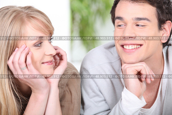 Couple flirting at home. Стоковое фото, агентство Ingram Publishing / Фотобанк Лори