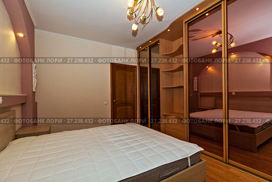 Cozy Bedroom. Стоковое фото, фотограф М / Фотобанк Лори