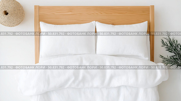 Cozy bedroom setup with white linens and wooden headboard for relaxation. Стоковое AI-изображение, AI-художник Katsiaryna Repich / Фотобанк Лори