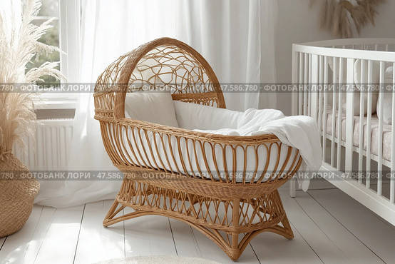 Cozy rattan bassinet in a softly lit nursery with white decor. Уютная кроватка из ротанга в мягко освещенной детской с белым декором. Стоковое AI-изображение, AI-художник Katsiaryna Repich / Фотобанк Лори