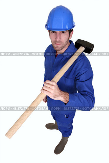 Craftsman with hammer. Стоковое фото, агентство Ingram Publishing / Фотобанк Лори