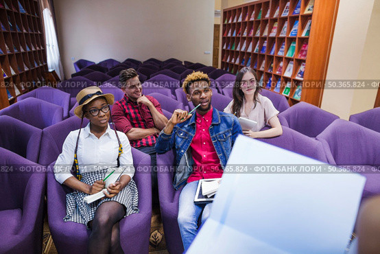 crop student with notebook classmates. Стоковое фото, агентство Ingram Publishing / Фотобанк Лори