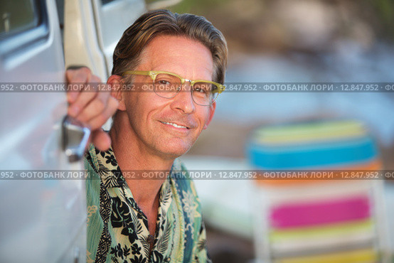 Cute Smiling Man Outdoors. Стоковое фото, фотограф Scott Griessel / PantherMedia / Фотобанк Лори