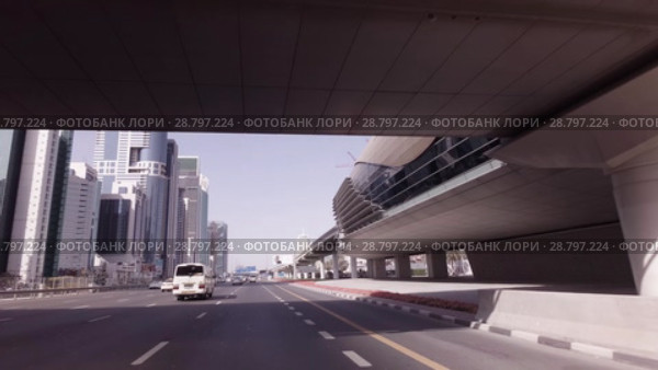 Day traffic in the business center of Dubai stock footage video (2018 год). Редакционное видео, видеограф Юлия Машкова / Фотобанк Лори