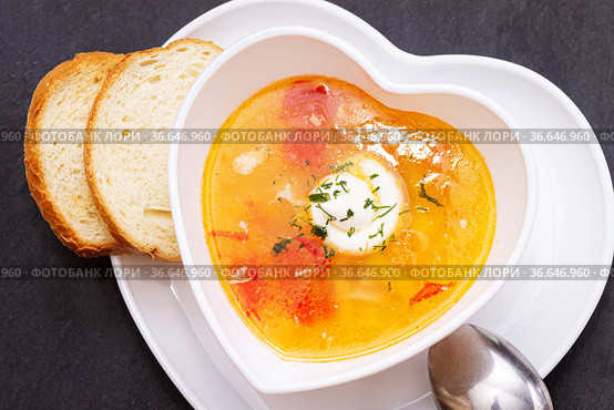 Delicious chicken soup with tomatoes close-up. Dinner. Стоковое фото, фотограф Татьяна  Коненкова / Фотобанк Лори