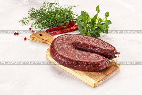 Delicious dry cured beef basturma on table, closeup. Стоковое фото, фотограф Андрей Старостин / Фотобанк Лори