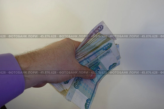 Деньги в руке. Money in hand. Стоковое фото, фотограф Юрий Пуликов / Фотобанк Лори