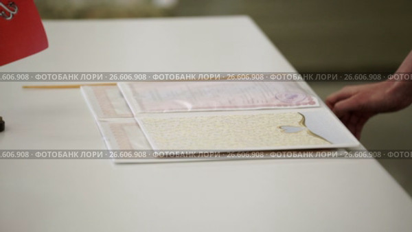 Documents on a table. Стоковое видео, видеограф Алексей / Фотобанк Лори