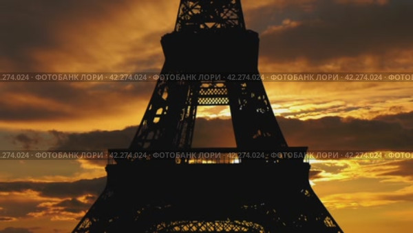 Eiffel Tower in Paris, France (against the background of the sunset, 4K, time lapse, with zoom) (2024 год). Стоковое видео, видеограф Владимир Журавлев / Фотобанк Лори