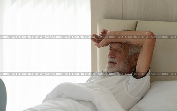Elderly patients with depressive symptoms waking up in the morning to do light exercise and have breakfast. Стоковое фото, агентство Ingram Publishing / Фотобанк Лори