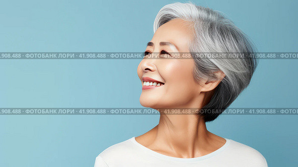 Elegant, smiling, elderly, chic Asian woman with gray hair and perfect skin on a light blue background banner. Стоковое AI-изображение, AI-художник ALLA YURTAYEVA / Фотобанк Лори