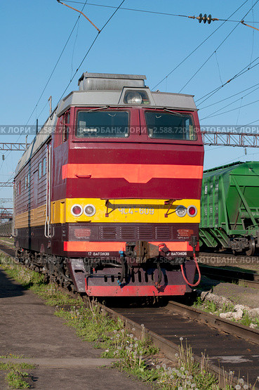 Электровоз ЧС-4т на станции Шарья Северной ж.д. (2011 год). Редакционное фото, фотограф Виктор Карасев / Фотобанк Лори