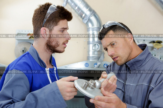 equipment cables and piping in an industrial power plant. Стоковое фото, агентство Ingram Publishing / Фотобанк Лори