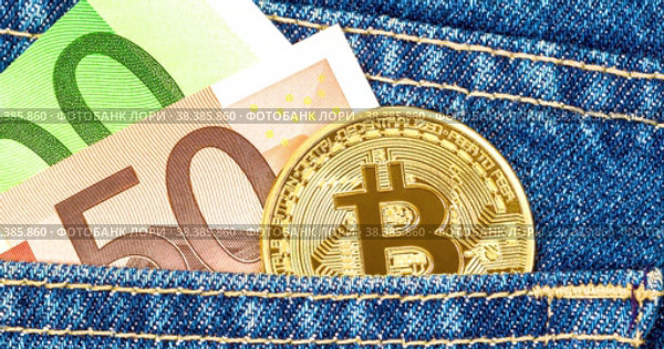 Euro banknotes and Bitcoin sticking out of the jeans pocket. Стоковая анимация, аниматор FotograFF / Фотобанк Лори