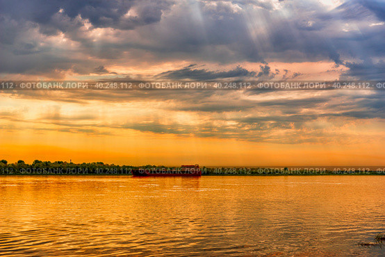 Evening landscape of the river with a tanker on it. Стоковое фото, фотограф Владимир Ушаров / Фотобанк Лори