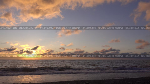 evening, romantic, sunset, husky, cute, run, adventure, pet, dog, shades, pastel, pink, building, city, promontory, outdoors, tranquil, motion, seaside, surf, calm, sea foam, seascape, beauty, coastline, pebbles, shore, beach, coast, foam, ocean, wave, nature, sky, landscape, blue, beautiful, light, background, sun, color, travel, summer, sea, cloud, clouds, water, horizon, dusk. Стоковое видео, видеограф Вера Ивановна Кубарева / Фотобанк Лори