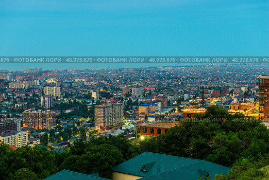 Evening view of the coastal city of Makhachkala from the observation deck of Mount Tarki-Tau. Dagestan. Стоковое фото, фотограф Константин Лабунский / Фотобанк Лори
