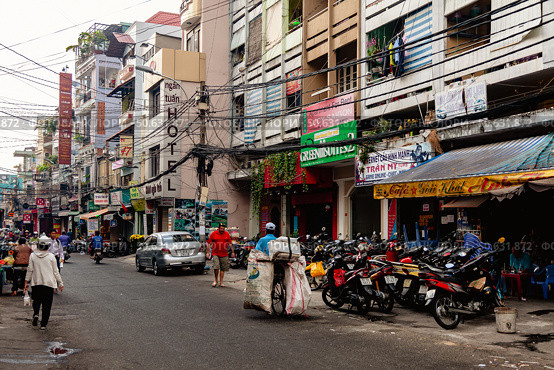 Everyday Busy Street in Ho Chi Minh City, Vietnam During Daytime (2024 год). Редакционное фото, фотограф Aleksandr Golubev / Фотобанк Лори