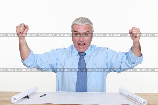 exited businessman raising his hands. Стоковое фото, агентство Ingram Publishing / Фотобанк Лори