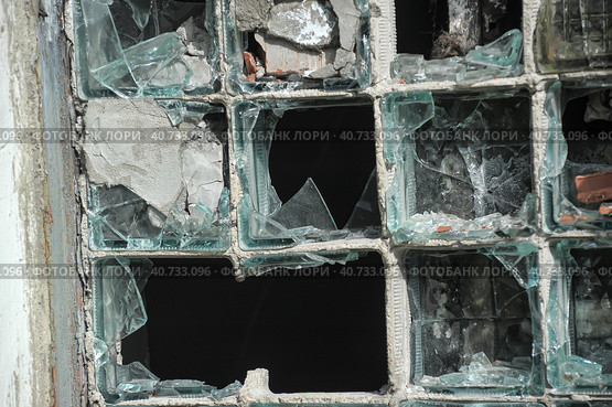 Exterior with broken windows of an old industrial building. Стоковое фото, фотограф Анна Кривицкая / Фотобанк Лори