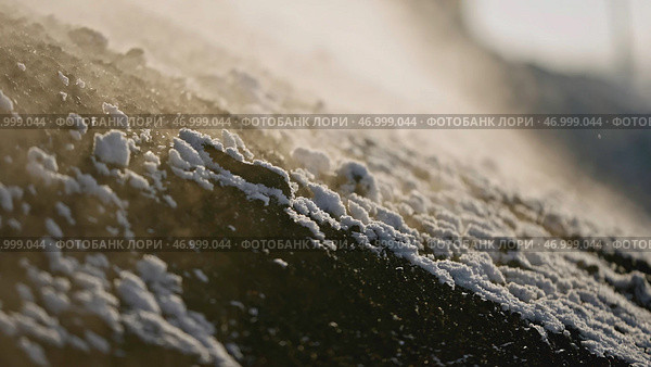 Extracted pile of mineral releases steam on winter day at quarry. Стоковое фото, фотограф David Kashakhi / Фотобанк Лори