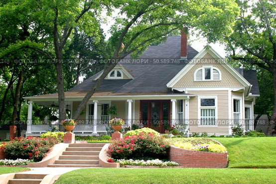Extremely colorful classic restored house in rural city. Стоковое фото, агентство Ingram Publishing / Фотобанк Лори