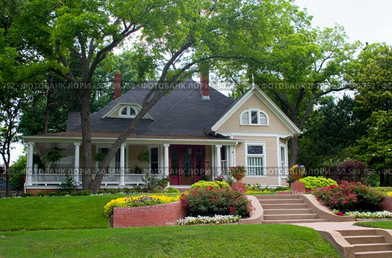 Extremely colorful classic restored house in rural city. Стоковое фото, агентство Ingram Publishing / Фотобанк Лори