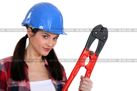 Female builder with boltcutters. Стоковое фото, агентство Ingram Publishing / Фотобанк Лори
