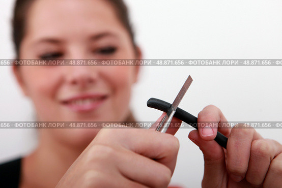 female, cutting, wire. Стоковое фото, агентство Ingram Publishing / Фотобанк Лори