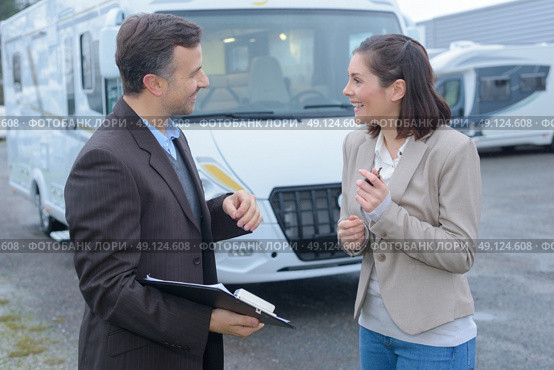 female driver holding happy to get driving results. Стоковое фото, агентство Ingram Publishing / Фотобанк Лори