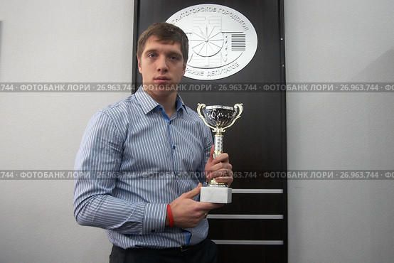Форвард клуба НХЛ Нью-йорк Айлендерс Николай Кулемин (2011 год). Редакционное фото, фотограф Константин Белихов / Фотобанк Лори