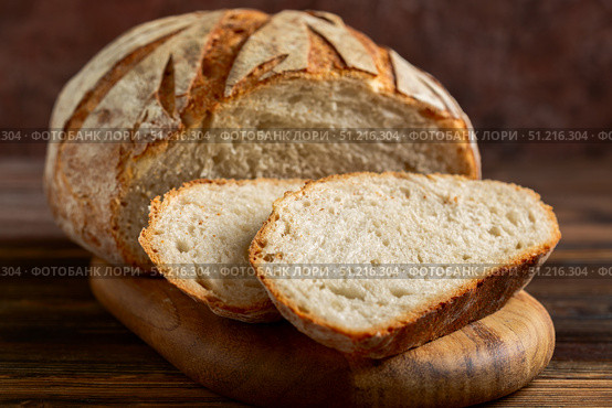 Fresh Artisan Sourdough Bread. Стоковое фото, фотограф Марина Сапрунова / Фотобанк Лори