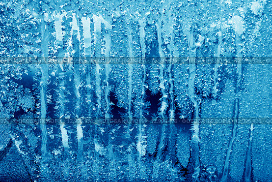 Frosty winter pattern at a window glass. Стоковое фото, фотограф ElenArt / Фотобанк Лори