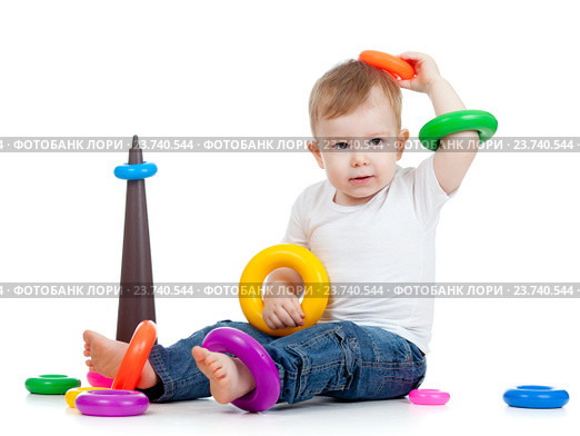 funny child playing with color toy. Стоковое фото, фотограф Оксана Кузьмина / Фотобанк Лори