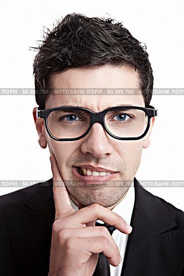 Funny portrait of a young businessman with a nerd glasses. Стоковое фото, агентство Ingram Publishing / Фотобанк Лори