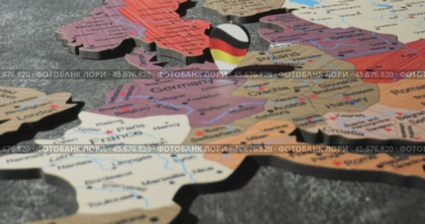 Germany - Travel concept with green pushpin on the world map. The location point on the map points to Berlin, the capital of the German. Стоковое видео, видеограф Андрей Армягов / Фотобанк Лори