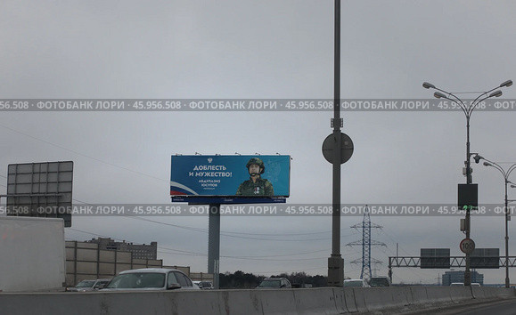 Герой СВО лейтенант Абдулазиз Юсупов на банере в Москве. Редакционное фото, фотограф Дмитрий Неумоин / Фотобанк Лори