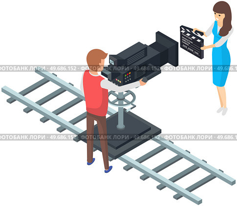 Girl holding movie clapper on camera. Filming starts, clap before new scene. Process of filming in pavilion. Man working with movie creation equipment. Cameraman shoots film on professional camera. Girl holding movie clapper on camera. Process of filming. Man working with film creation equipment. Стоковая иллюстрация, агентство Ingram Publishing / Фотобанк Лори